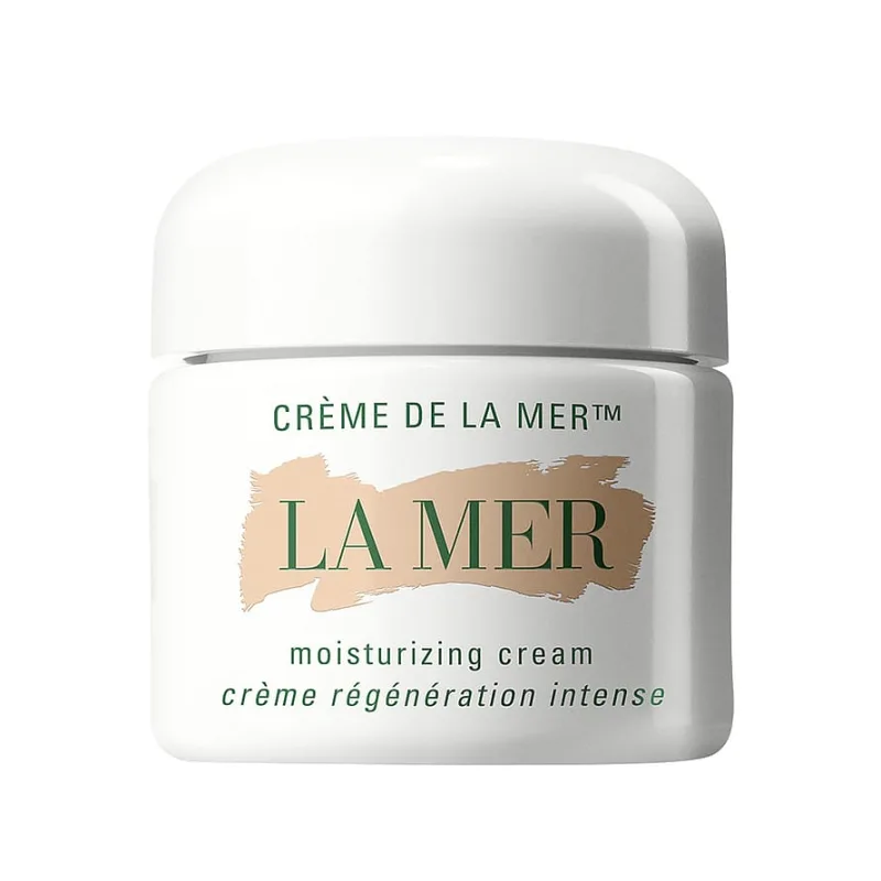 Vit burk Crème de la Mer Moisturizing Cream med grön text och La Mer-logotypen